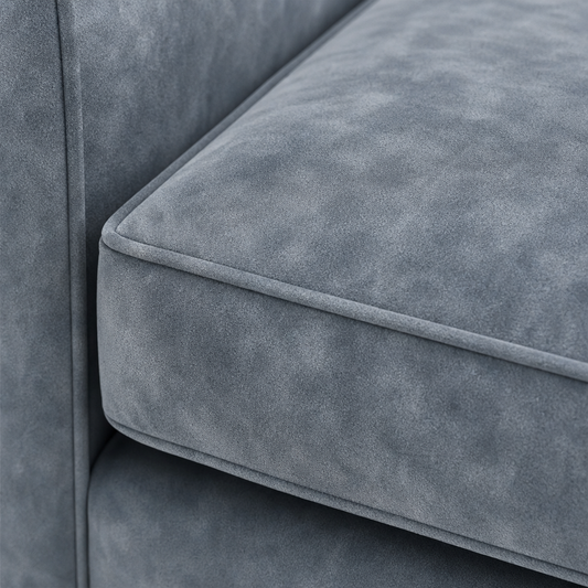 Close-up of a gray sofa with a textured surface