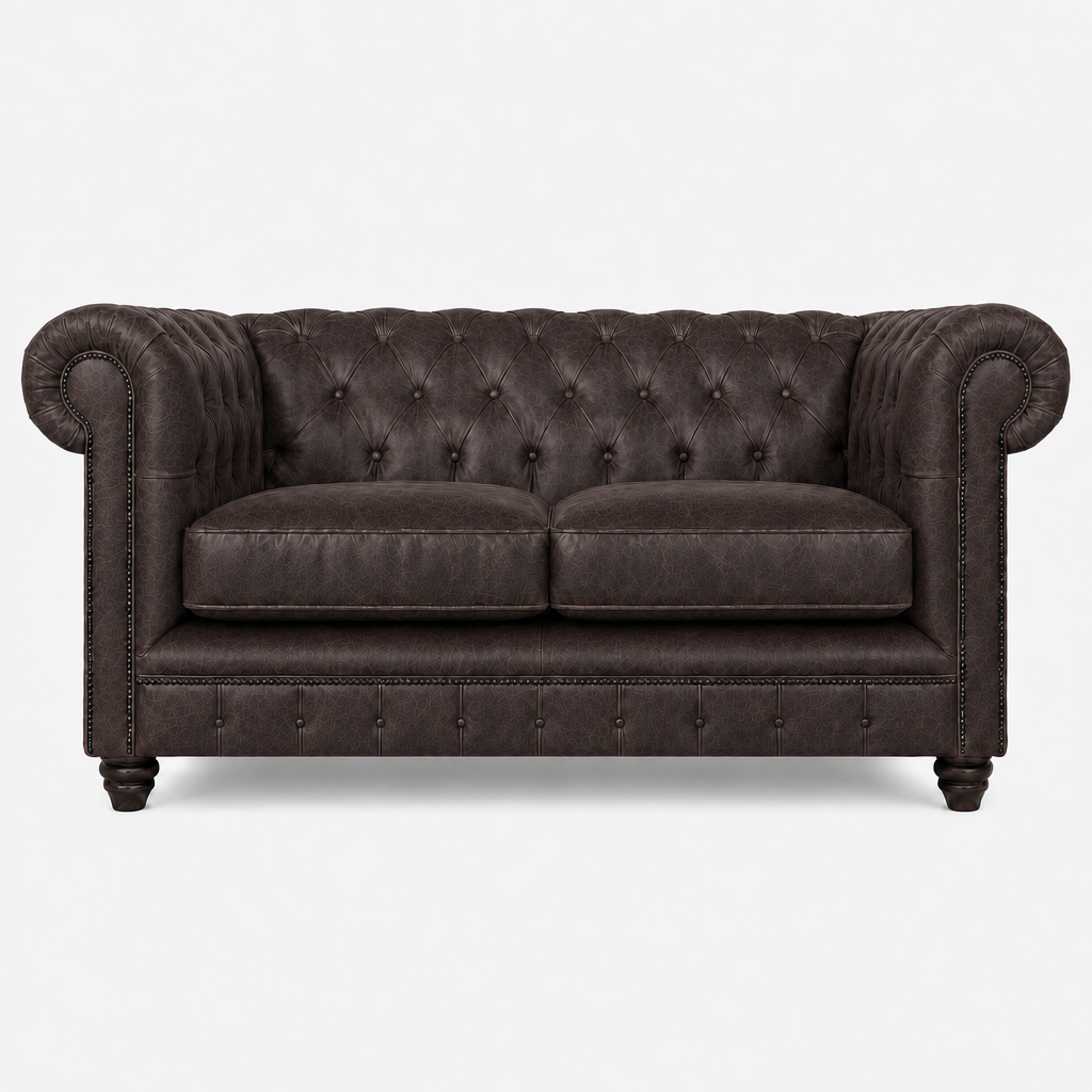 Dark brown leather sofa with tufted backrest on a white background