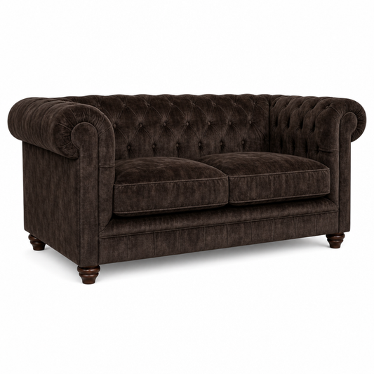 Brown velvet sofa on a white background