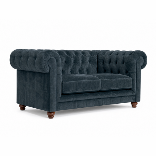 Blue velvet sofa on a white background