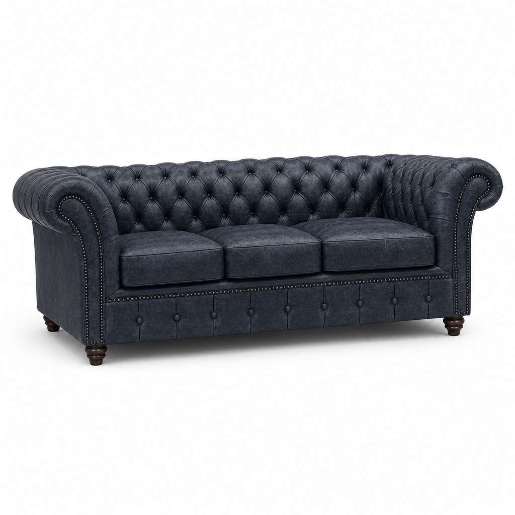 Blue tufted sofa on a white background