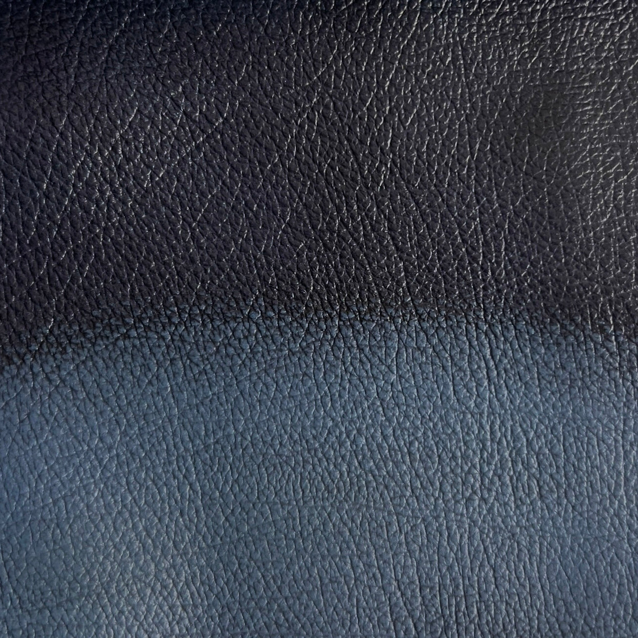 Close-up of dark blue and light bule leather texture