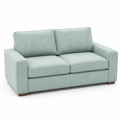 Light blue velvet sofa on a white background