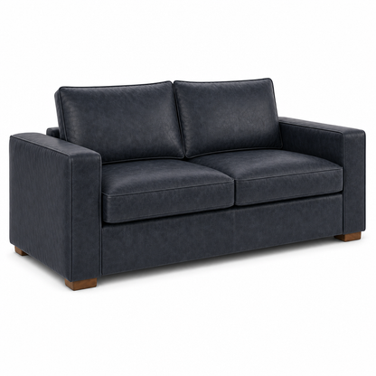 Blue leather sofa on a white background