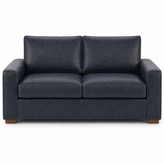 Blue leather sofa on a white background
