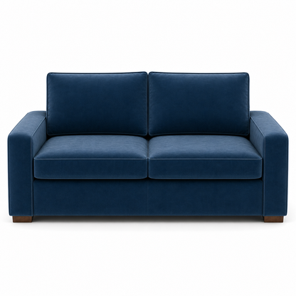 Blue velvet sofa on a white background