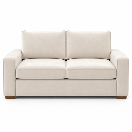 Cream velvet sofa on a white background