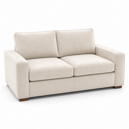 Cream velvet sofa on a white background
