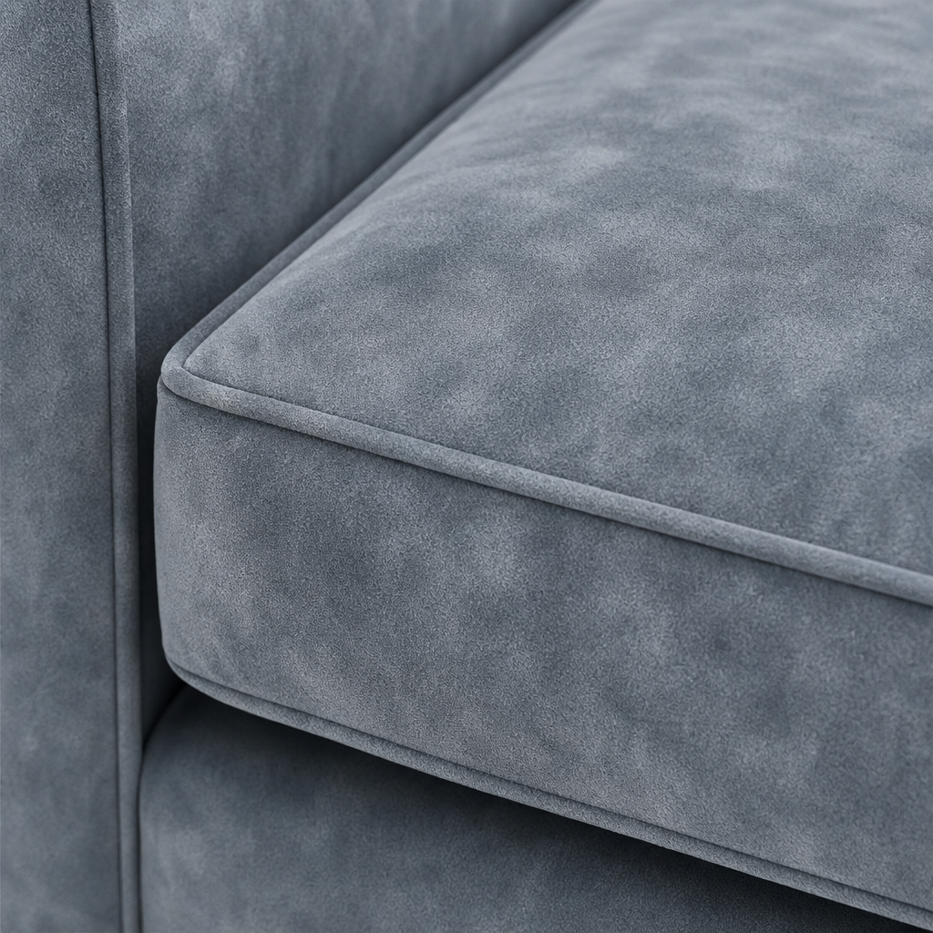 Close-up of a gray sofa with a textured surface
