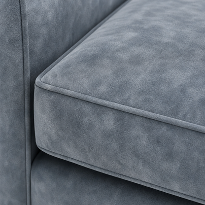 Close-up of a gray sofa with a textured surface