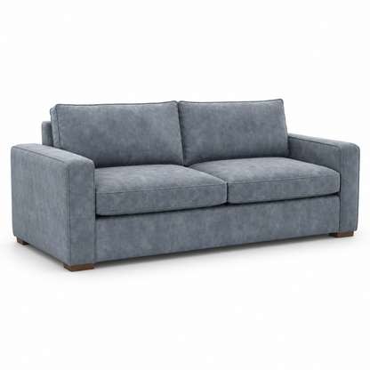 Gray velvet sofa on a white background