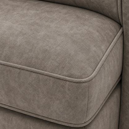 Close-up of a brown upholstered chair with visible stitching