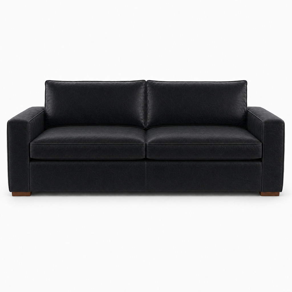 Black leather sofa on a white background