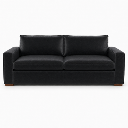 Black leather sofa on a white background