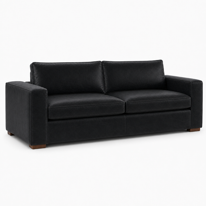 Black leather sofa on a white background