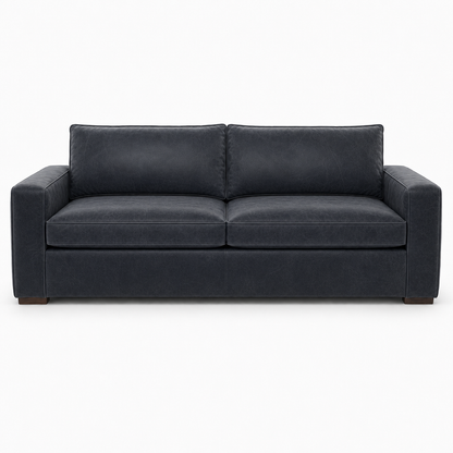 Black leather sofa on a white background