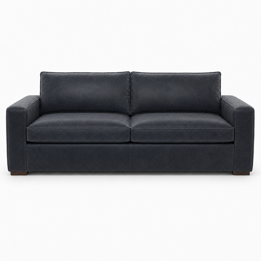 Black leather sofa on a white background