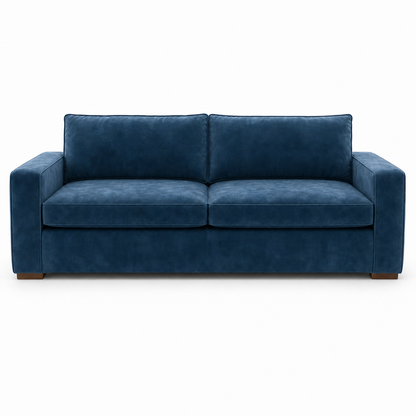 Blue velvet sofa on a white background