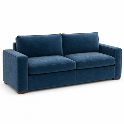Blue velvet sofa on a white background