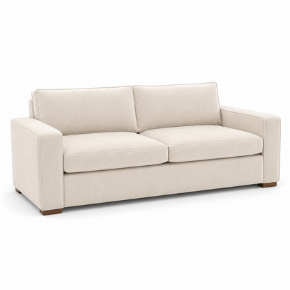 cream velvet sofa on a white background