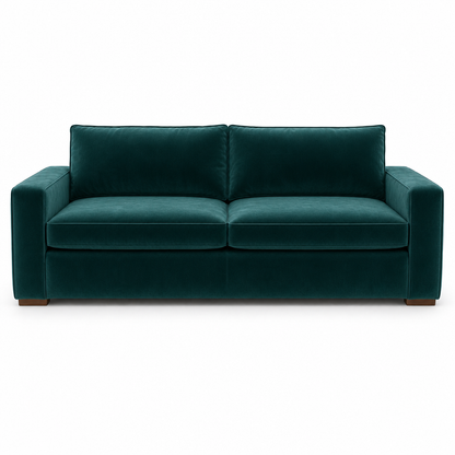 Green velvet sofa on a white background