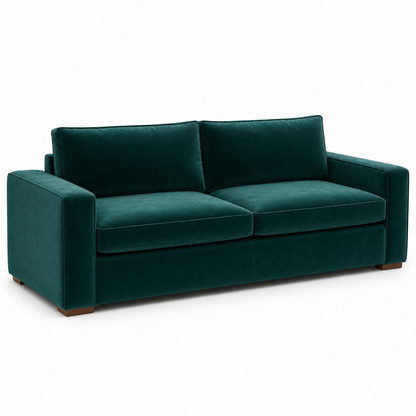 Green velvet sofa on a white background