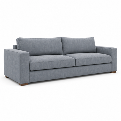 Gray velvet sofa on a white background