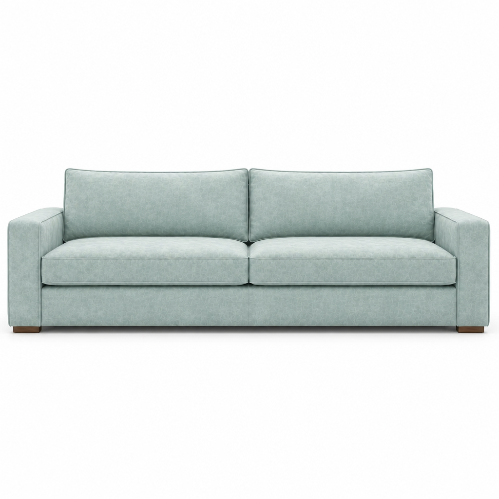 Light blue velvet sofa on a white background