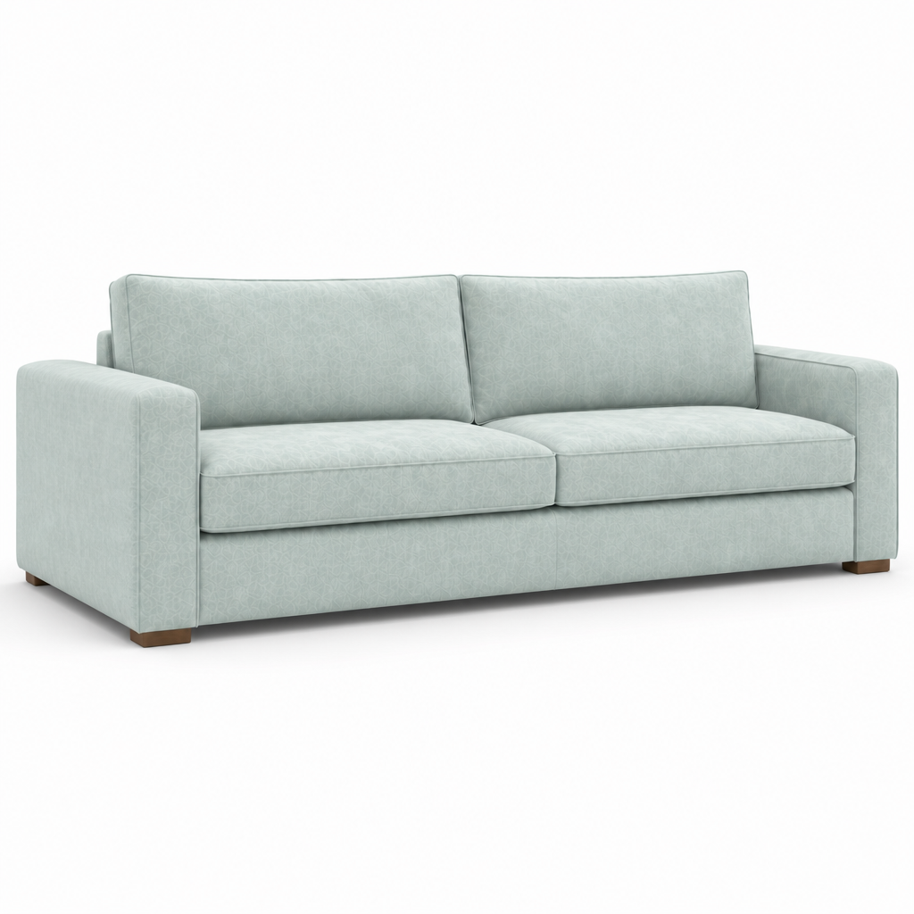 Light gray velvet sofa on a white background