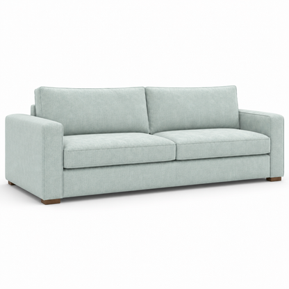 Light gray velvet sofa on a white background