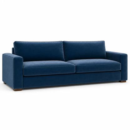 Blue velvet sofa on a white background