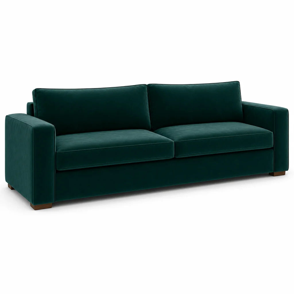 Green velvet sofa on a white background