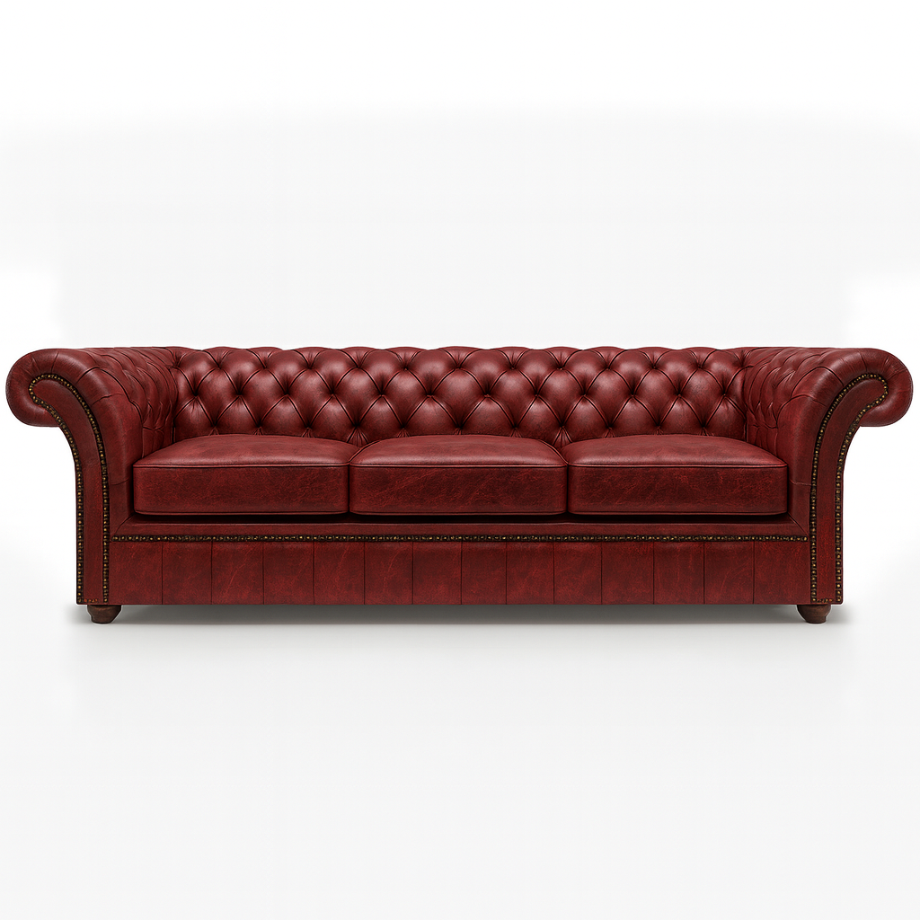 Red british  leather chesterfield sofa on a white background