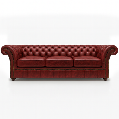 Red british  leather chesterfield sofa on a white background