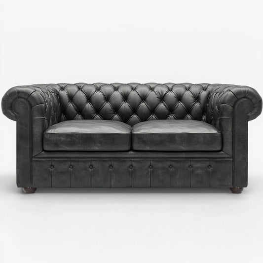 Black british leather chesterfield sofa on a white background