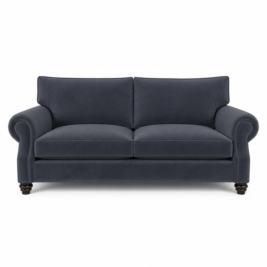 A classic two-seater loveseat sofa upholstered in dark navy blue velvet fabric, featuring rolled arms, a high back, and dark wooden legs, shown against a plain white background.