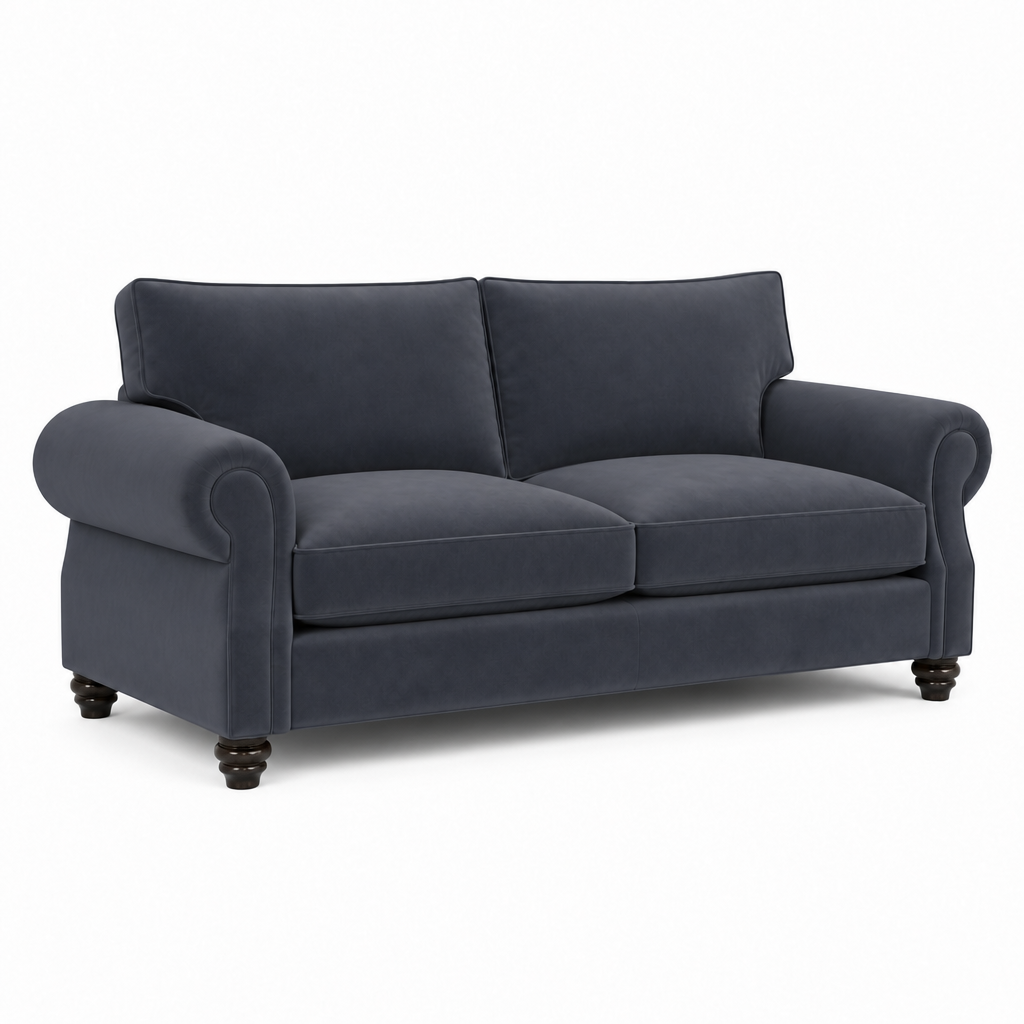 A navy blue velvet loveseat sofa with rolled arms, two back cushions, two seat cushions, and dark turned wooden legs, shown on a plain white background.