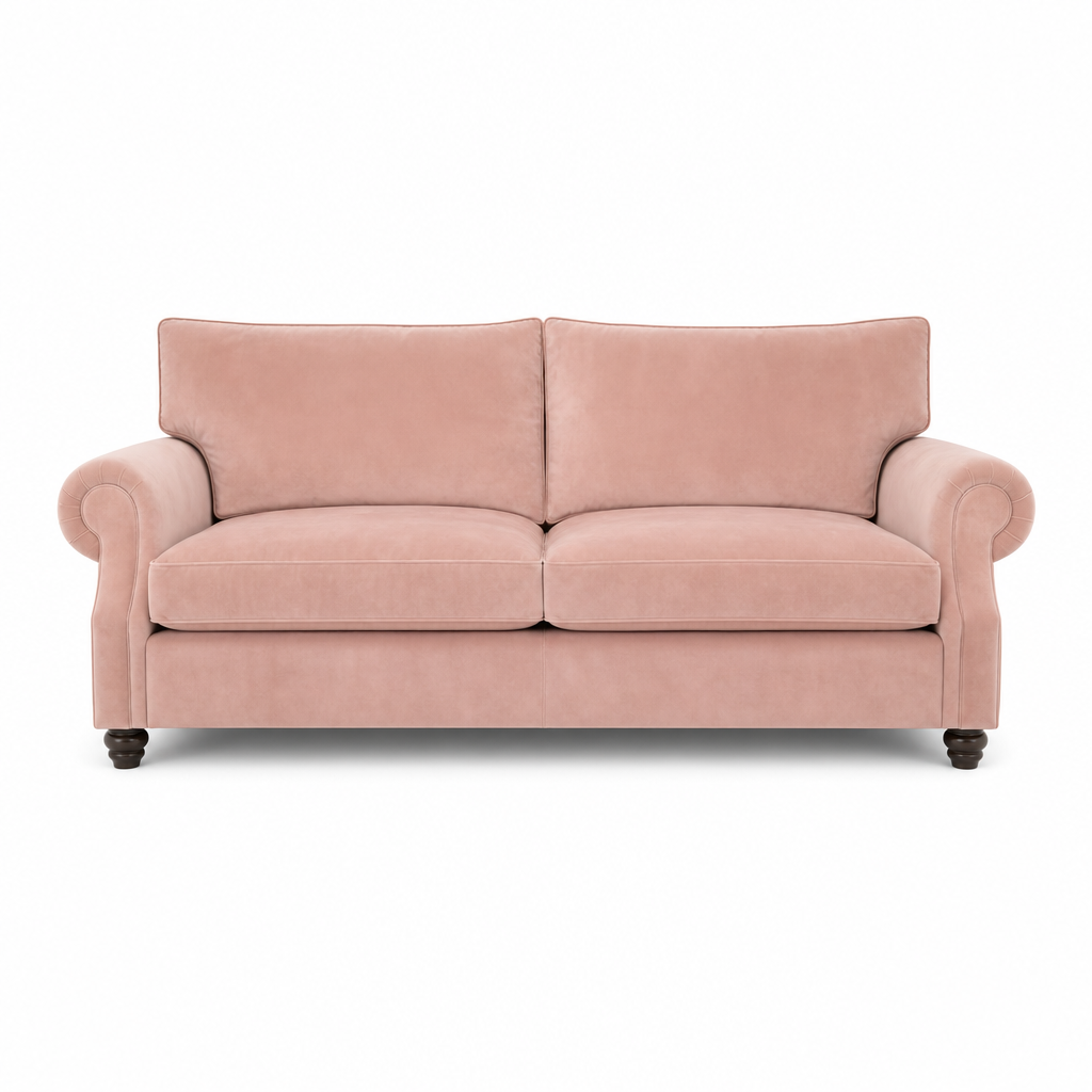 A two-seater loveseat sofa upholstered in dusty pink velvet, featuring rolled arms, two back cushions, two seat cushions, and dark turned wood legs, shown against a plain white background.