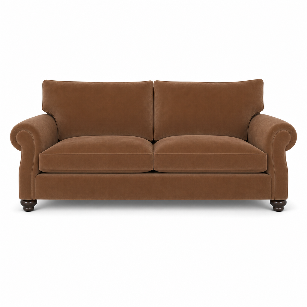 A classic two-seater loveseat sofa upholstered in a warm brown velvet fabric, featuring rolled arms, two back cushions, two seat cushions, and dark turned wood legs, shown against a plain white background.