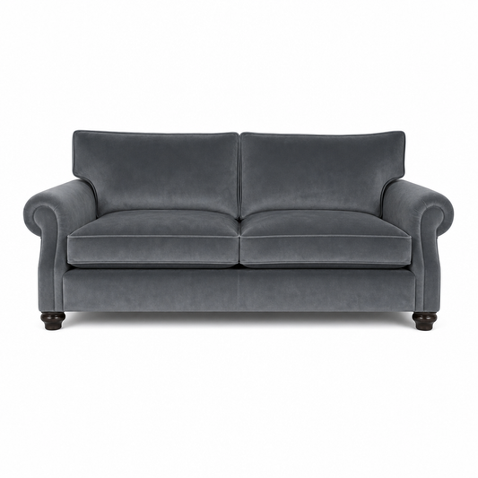 A classic two-seater loveseat sofa upholstered in dark gray velvet fabric, featuring rolled arms, a high back, and dark wooden legs, shown against a plain white background.