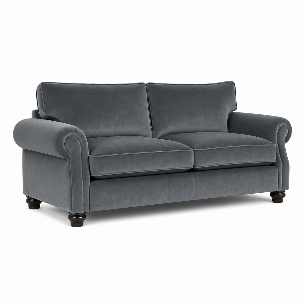 A classic two-seater loveseat sofa upholstered in dark gray velvet fabric, featuring rolled arms, dark wooden legs, and a clean silhouette on a white background.