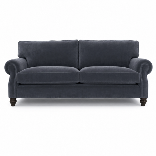 A classic two-seater loveseat sofa upholstered in dark slate blue velvet fabric, featuring dark wooden turned legs, shown against a plain white background.