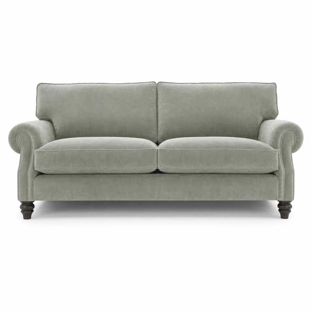 A classic two-seater loveseat sofa upholstered in a textured light sage green fabric, featuring dark turned wooden legs and rolled arms, shown against a plain white background.