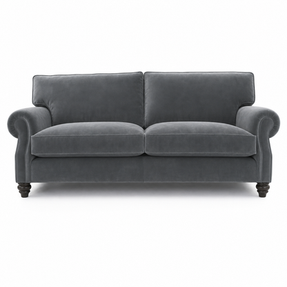 A dark gray velvet loveseat sofa with rolled arms and dark wooden turned legs, shown from a front-facing perspective on a white background.