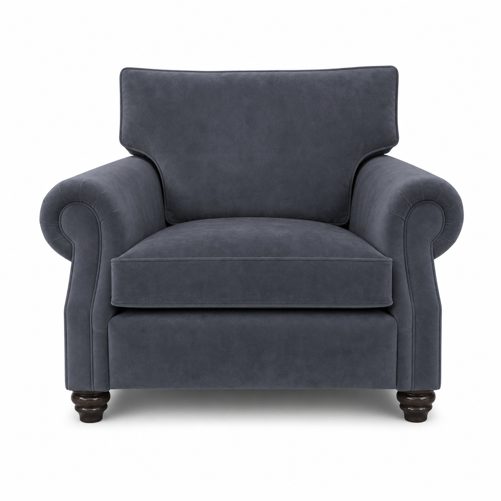 A classic armchair upholstered in dark slate blue velvet fabric, featuring rolled arms, a high backrest, and dark wooden turned legs, shown against a plain white background.