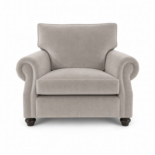A classic upholstered armchair in light gray fabric, featuring rolled arms, a high back, and dark wooden legs, shown against a plain white background.