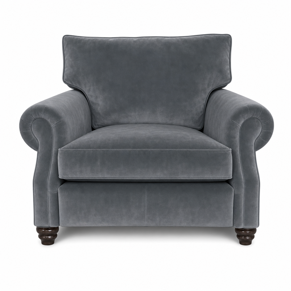 A classic gray velvet armchair with rolled arms, a high backrest, and dark wooden turned legs, shown against a plain white background.