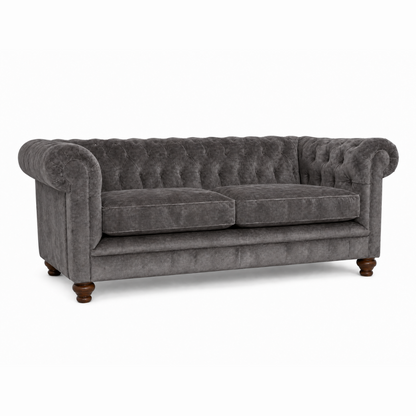 Gray velvet sofa with wooden legs on a white background