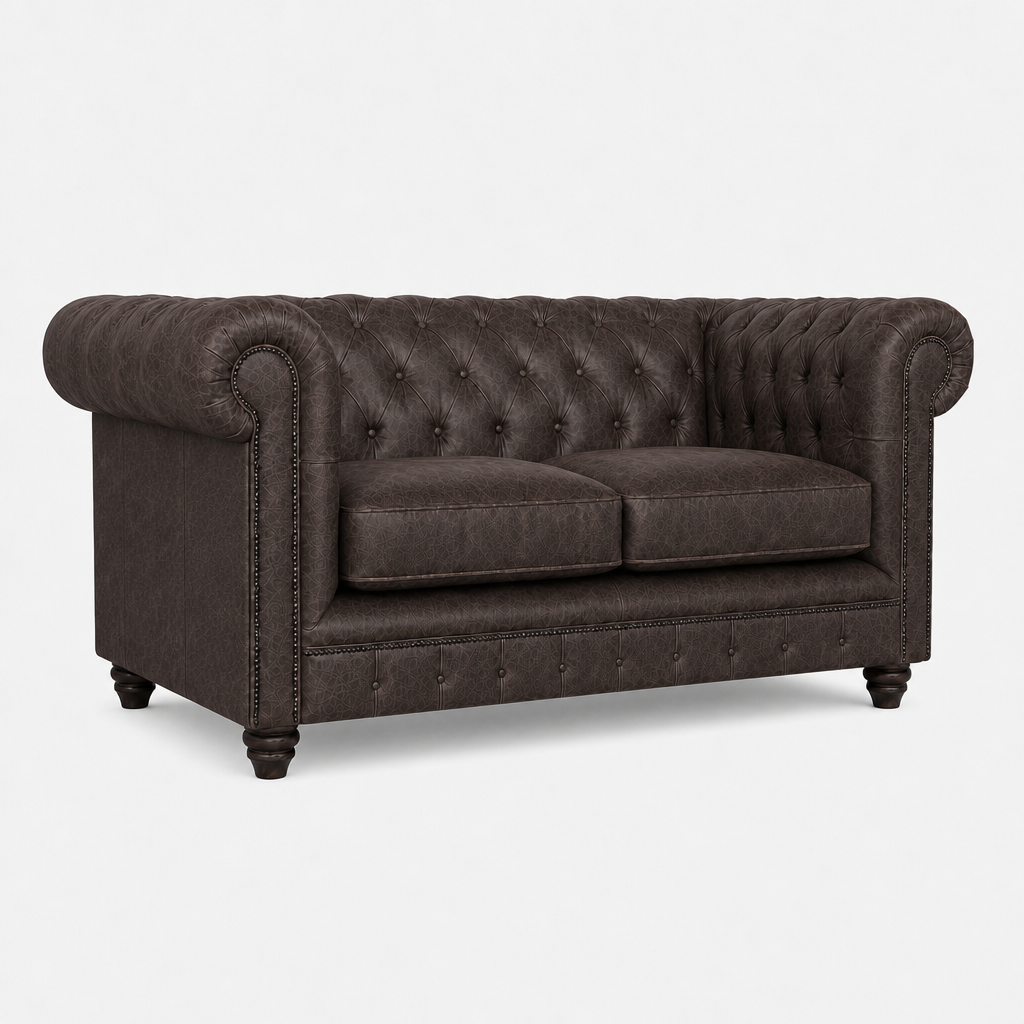 Brown tufted sofa on a white background
