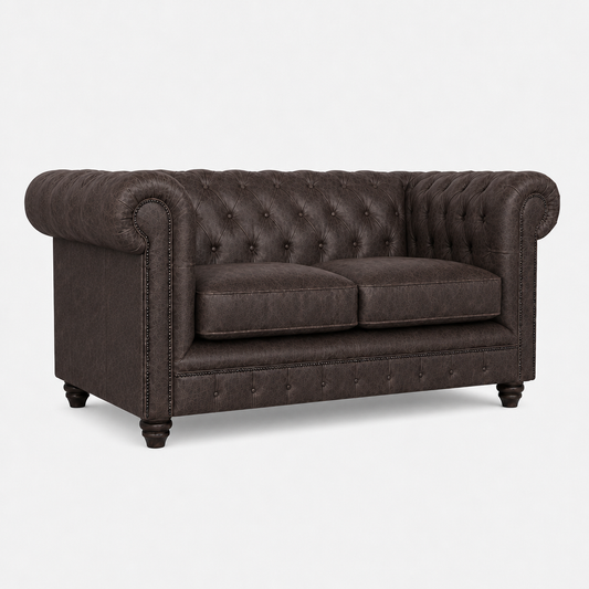 Brown tufted sofa on a white background